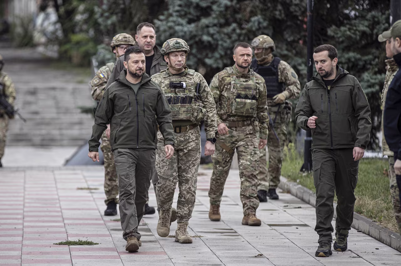 Ukrainian President Volodymyr Zelenskyy attends flag hoisting ceremony in Izium on Wednesday. 