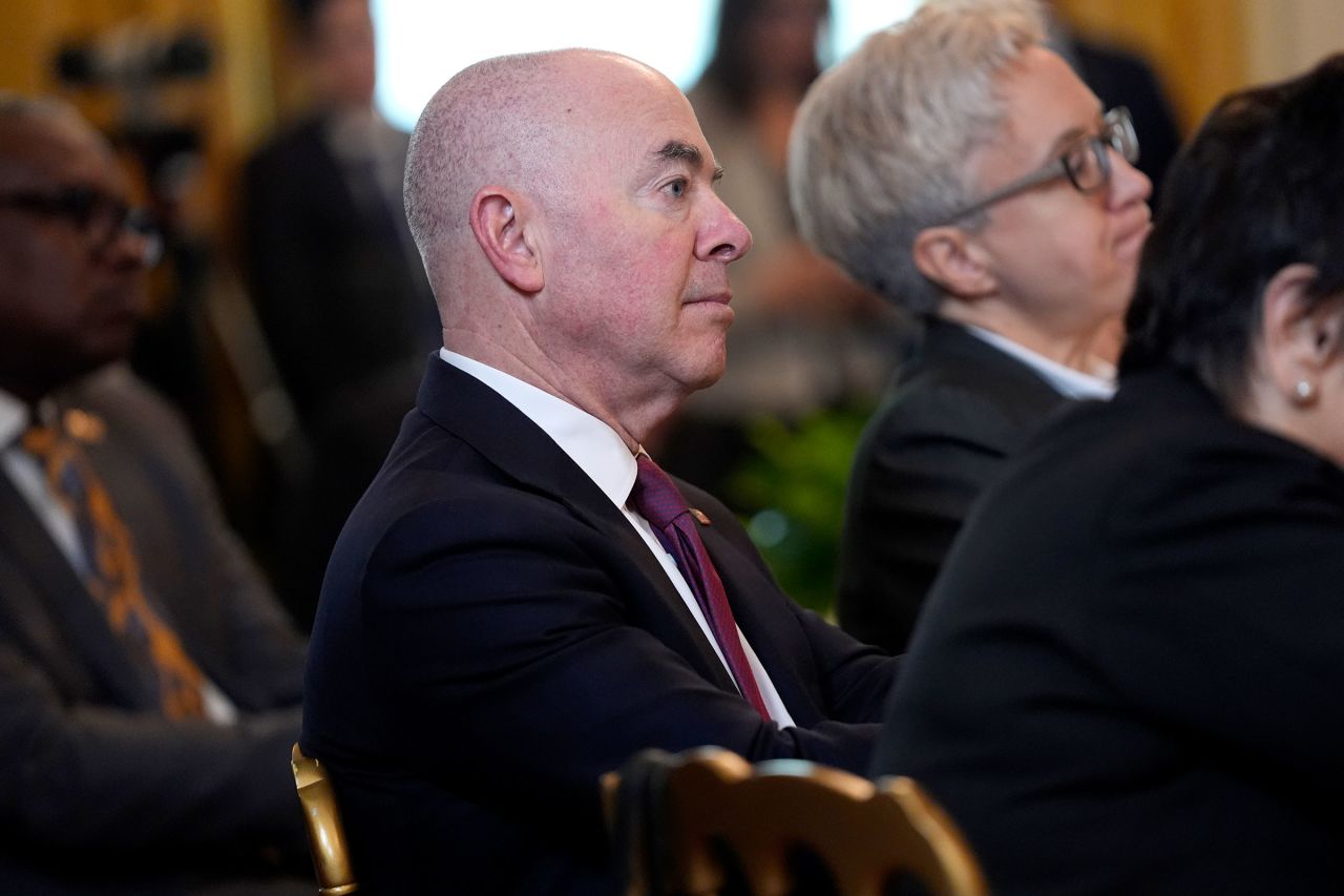 Homeland Security Secretary Alejandro Mayorkas listens as first lady Jill Biden speaks to the National Governors Association during an event in the East Room of the White House on Friday, February 23, in Washington, DC. 