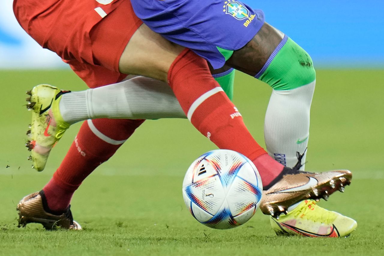 Brazil's Vinicius Junior, right, and Switzerland's Fabian Rieder challenge for the ball on Monday.