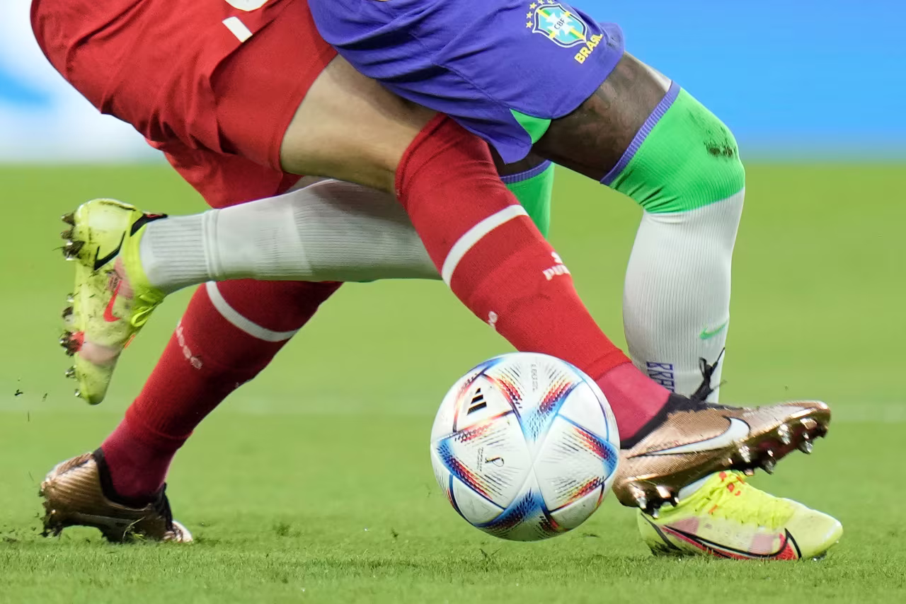 Brazil's Vinicius Junior, right, and Switzerland's Fabian Rieder challenge for the ball on Monday.