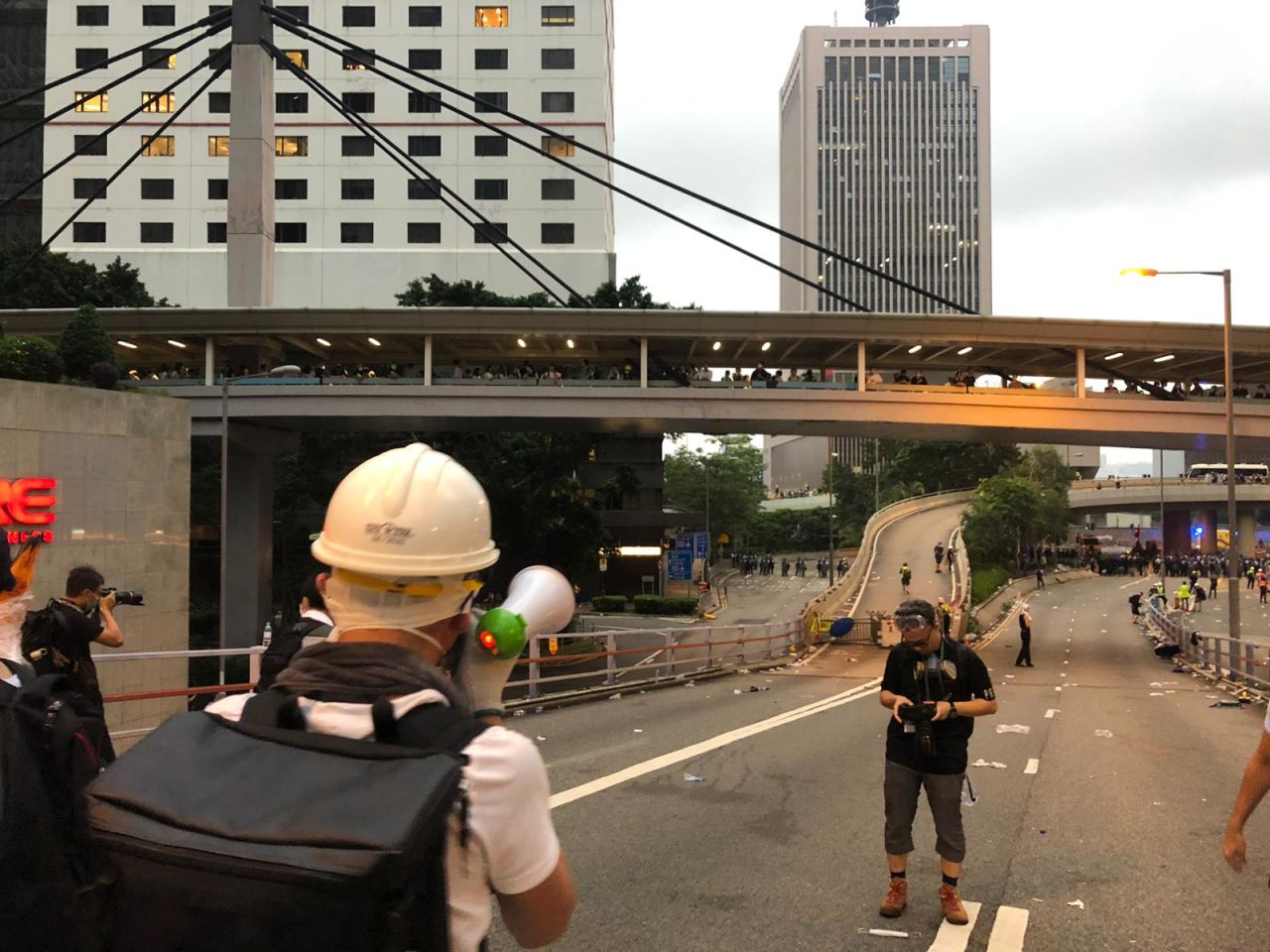 Protesters are being pushed up Cotton Tree Drive.