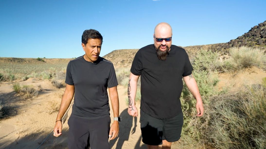 Edward Mowery and CNN Chief Medical Correspondent Dr. Sanjay Gupta walk through Petroglyph National Monument in New Mexico.