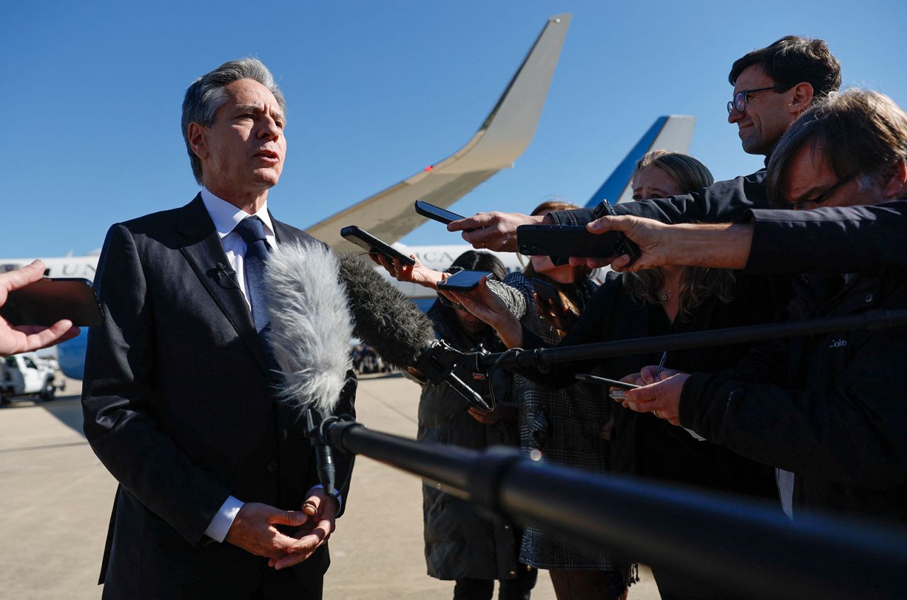 Antony Blinken talks to reporters prior to boarding his aircraft at Joint Base Andrews in Maryland, on his way to the Middle East and Asia on November 2.