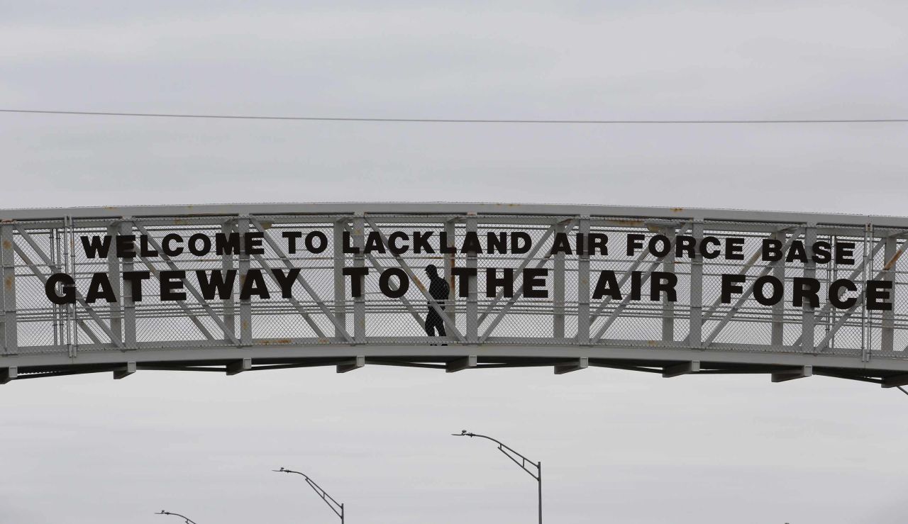 A pedestrian uses a walkway at Lackland Air Force Base in San Antonio on February 5.