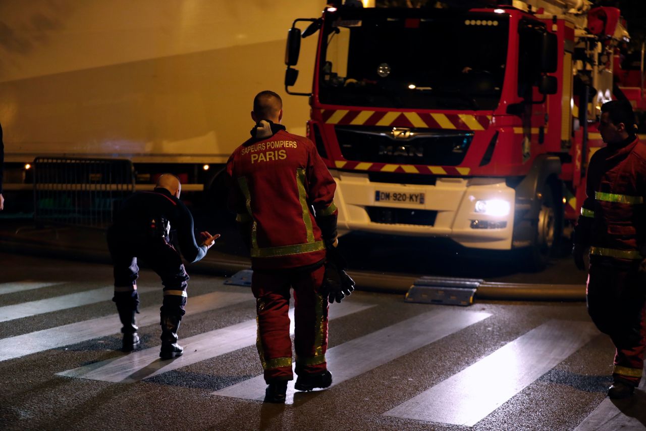 The huge fire that devastated Notre Dame Cathedral is 'under control,' the Paris fire brigade said early Tuesday morning after firefighters spent hours battling the flames.