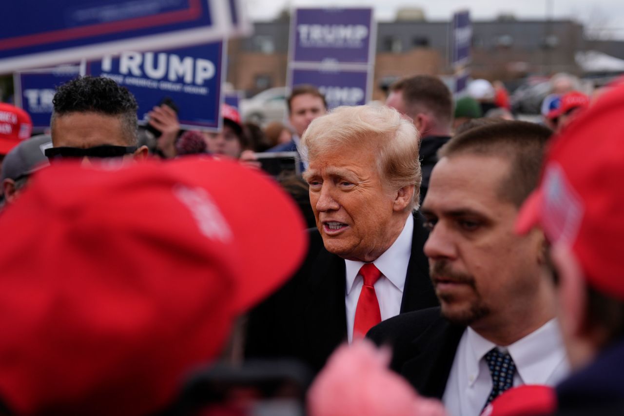 Trump greets supporters at a campaign stop in Londonderry, New Hampshire, on Tuesday.