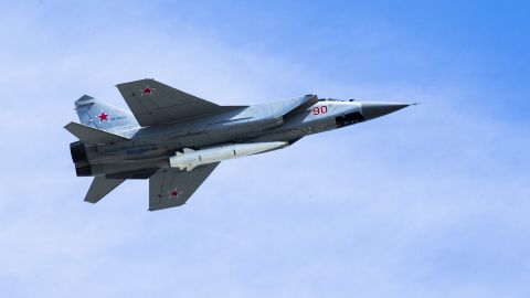 A Russian Air Force MiG-31K jet carries a high-precision hypersonic aero-ballistic missile Kh-47M2 Kinzhal during the Victory Day military parade in Moscow in this May 9, 2018 ima