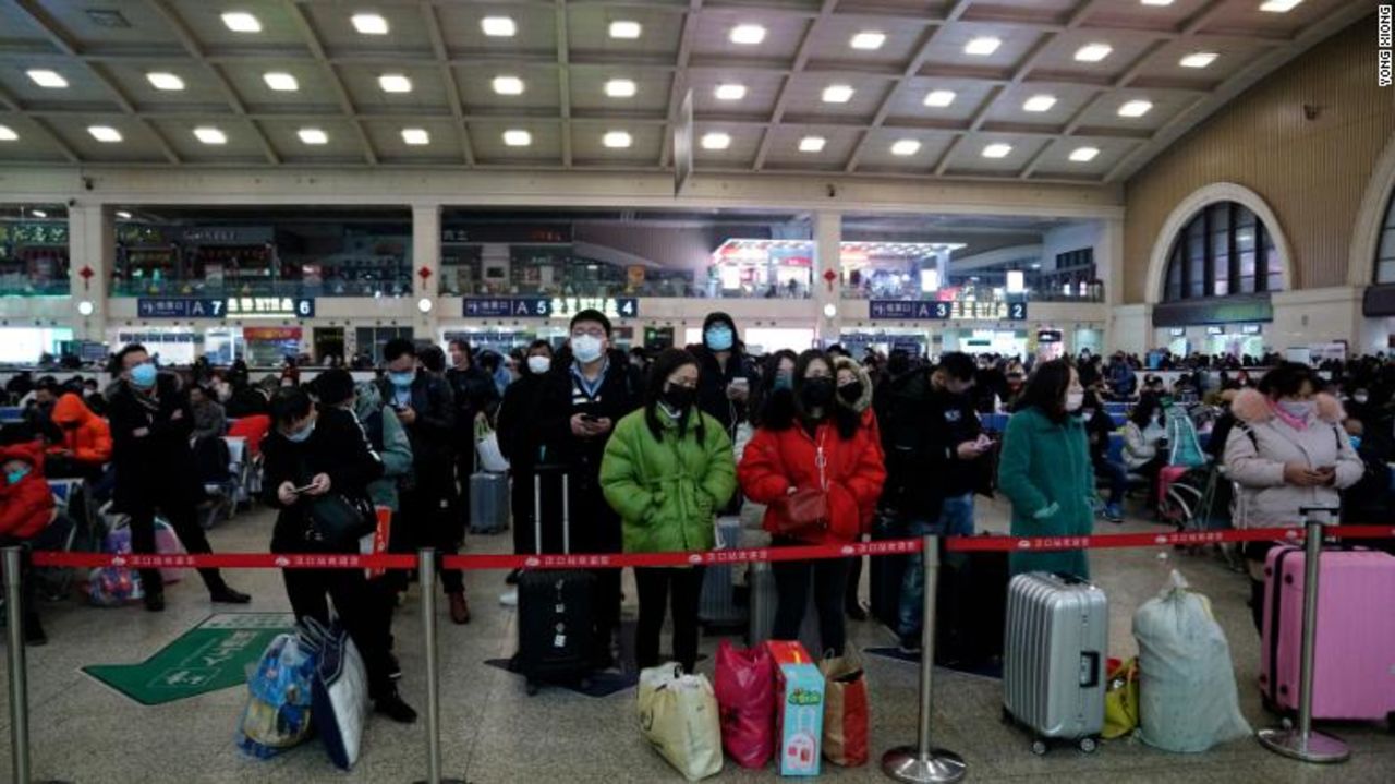 Travelers at Wuhan's Hankou railway station on Thursday morning before the lockdown.