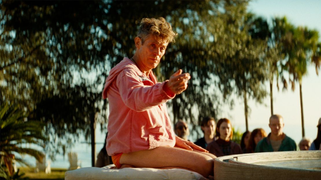 Dafoe as cult leader Omi, with disciples played by Stone and Plemons in the back of shot, in the third story of Yorgos Lanthimos' "Kinds of the Kindness."