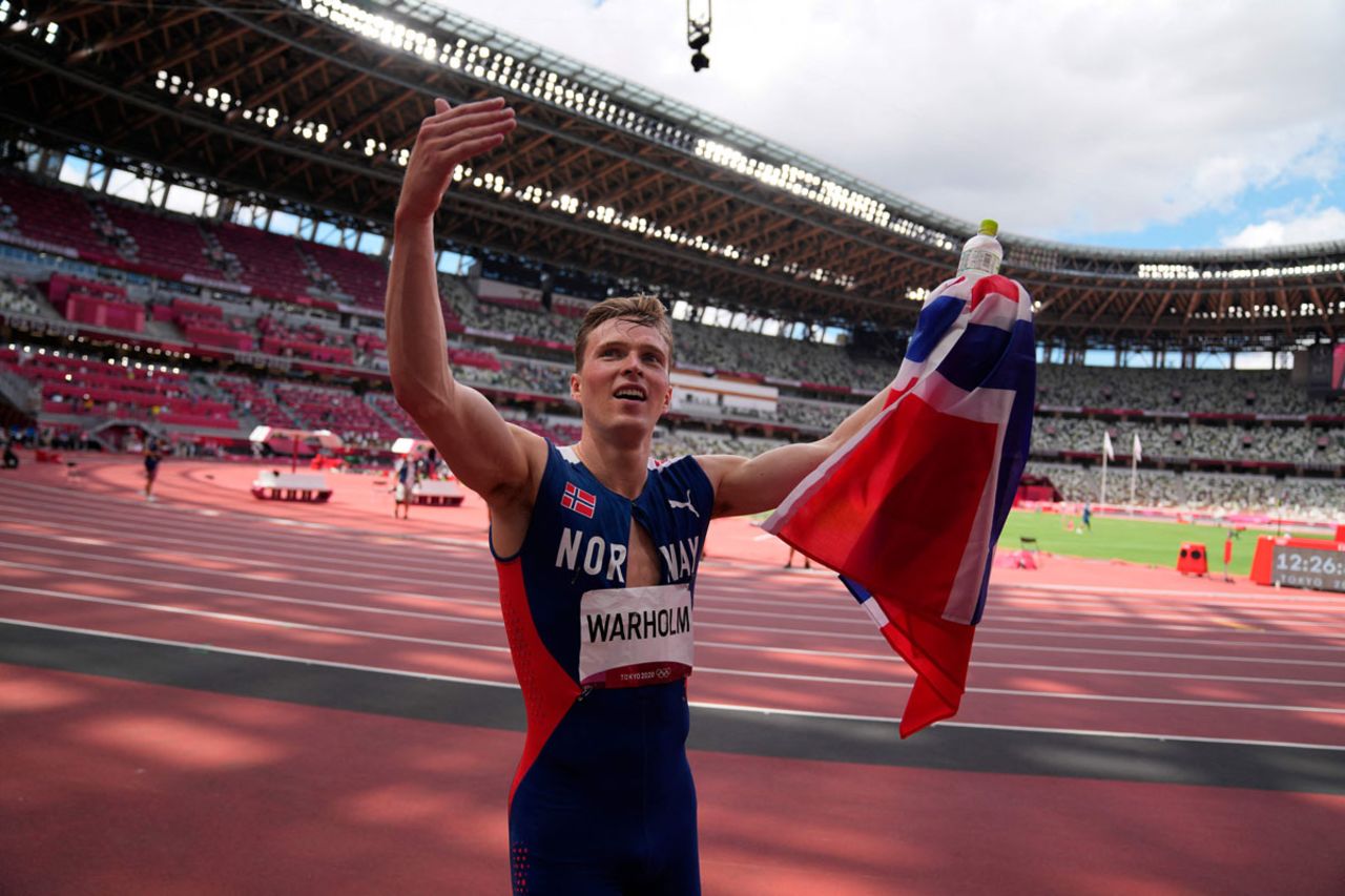 Norway's Karsten Warholm reacts after winning and breaking the world record in the men's 400 meter hurdles final.