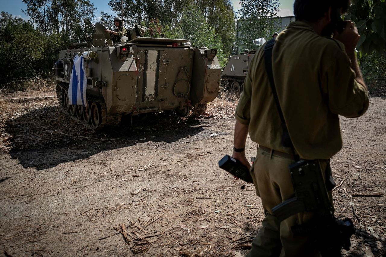 Israeli soldiers and military vehicles stationed near the Israel-Labanon border on October 16.