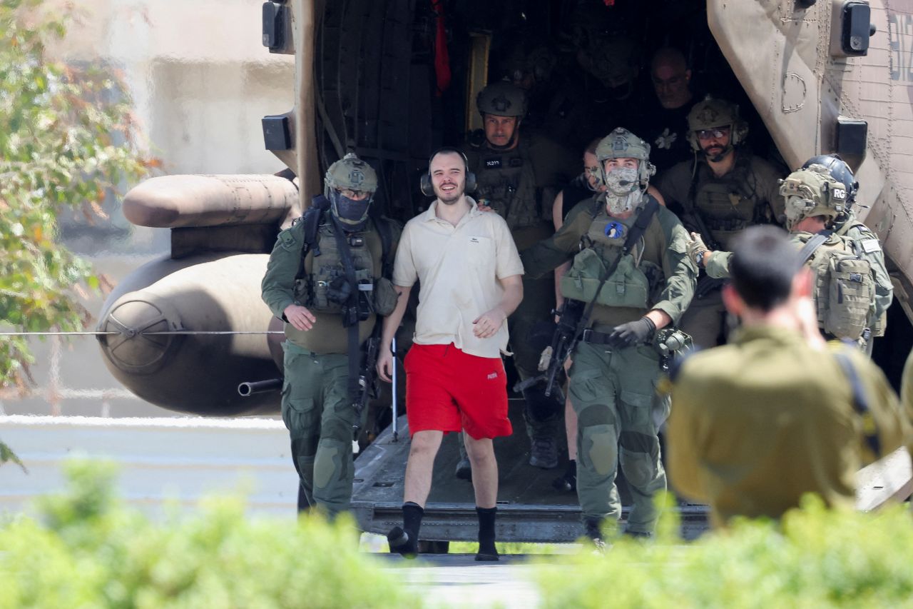 Andrey Kozlov, one of the rescued hostages, walks off a military helicopter in Ramat Gan, Israel, on Saturday, June 8. 