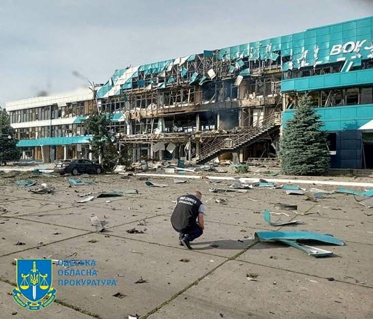An inspector surveys the damage at a grain port facility after a reported attack by Russian military drones in,?Izmail, Ukraine, on August 2. 