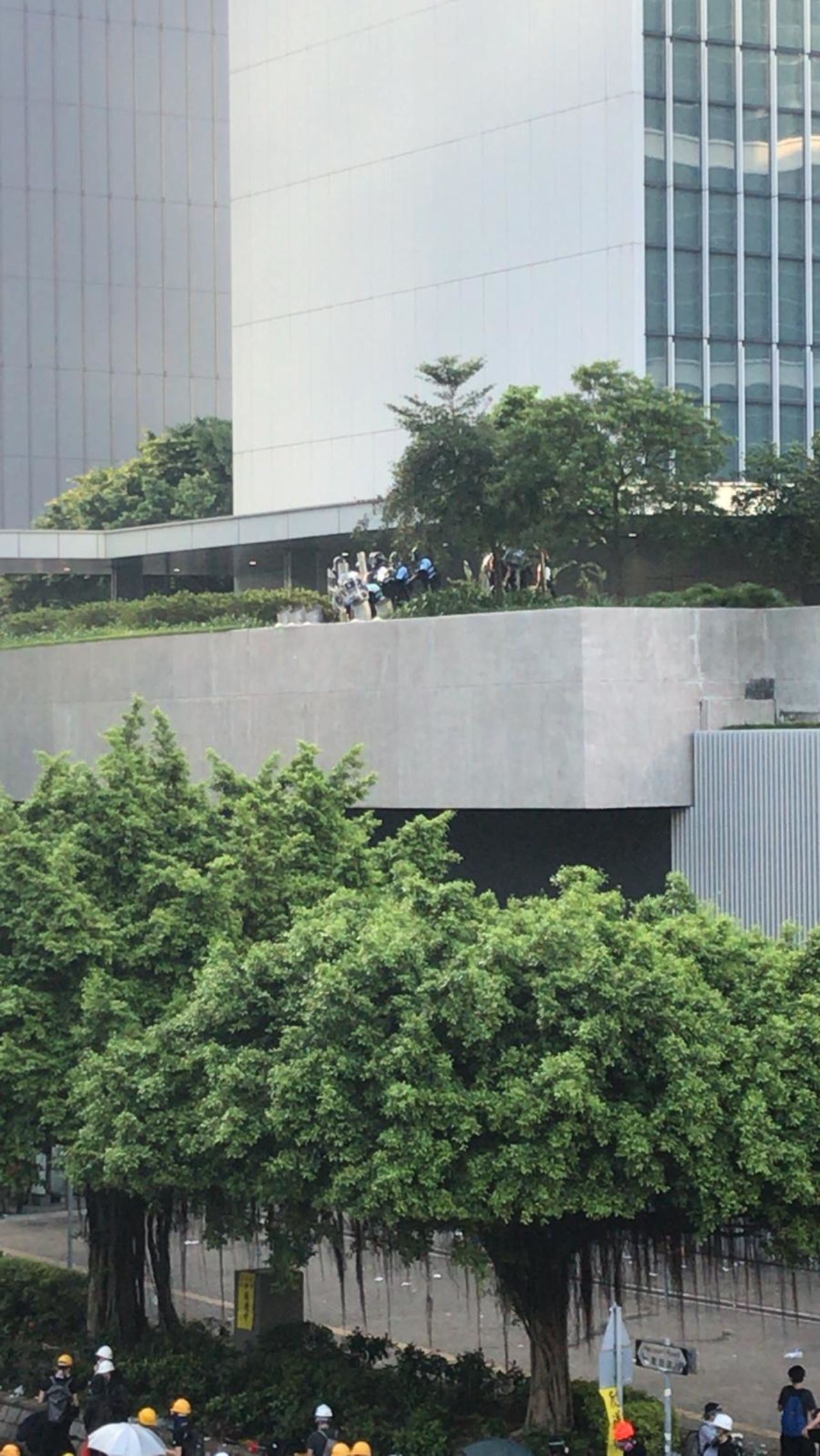 Police have been firing tear gas, but few protesters are leaving Admiralty.