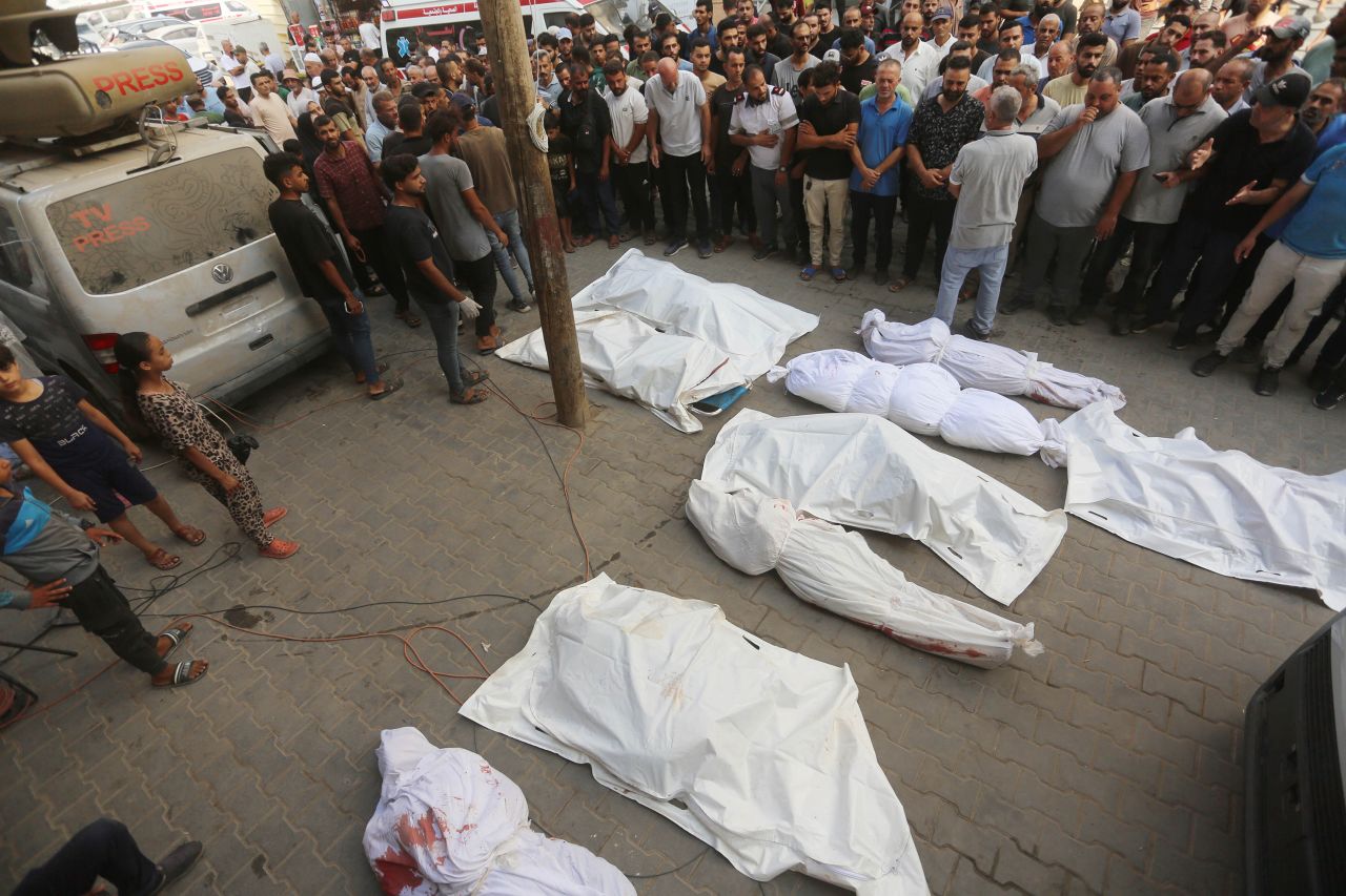 Palestinians in Gaza City mourn their relatives who were killed by an Israeli attack on August 31.