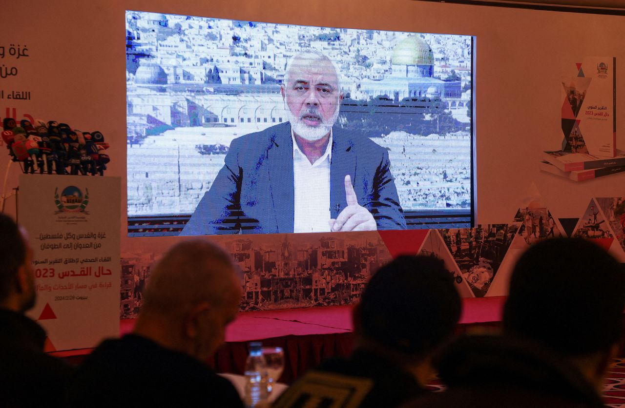 Hamas leader, Ismail Haniyeh, speaks in a pre-recorded message shown on a screen during a press event for Al Quds International Institution in Beirut, Lebanon on February 28.