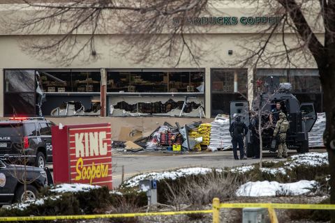Tactical police units respond to the scene of a King Soopers grocery store after a shooting on March 22, in Boulder, Colorado.