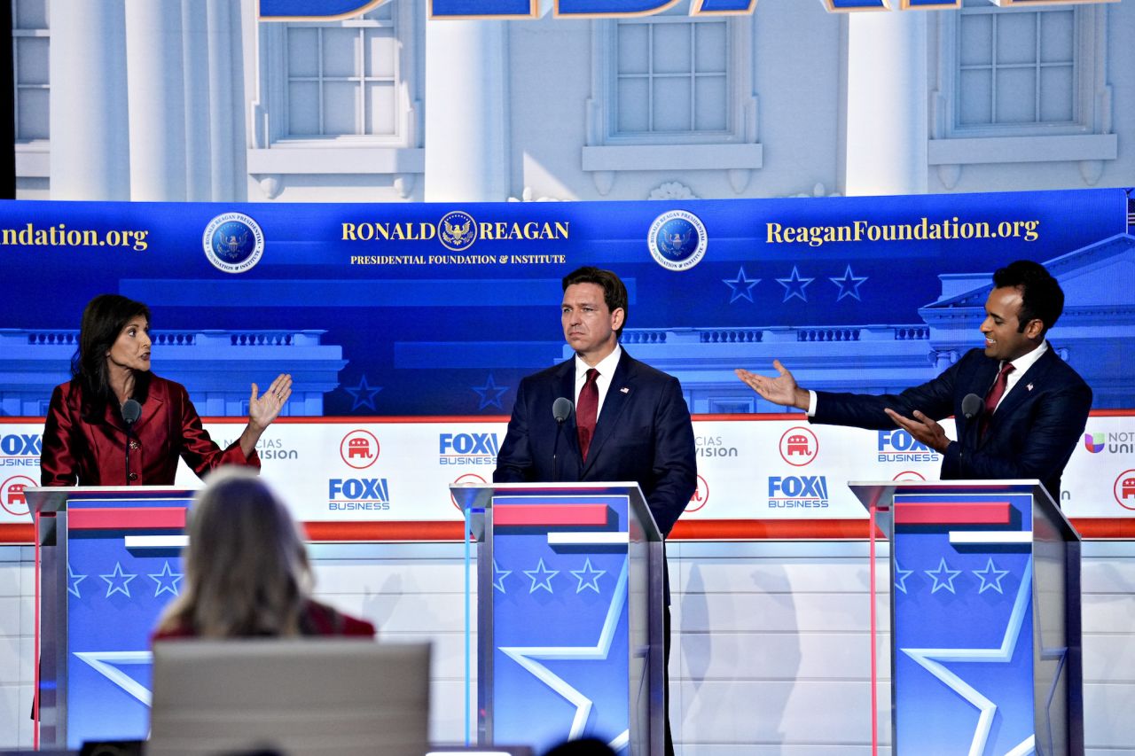 Ron DeSantis is seen between Nikki Haley, left, and Vivek Ramaswamy.