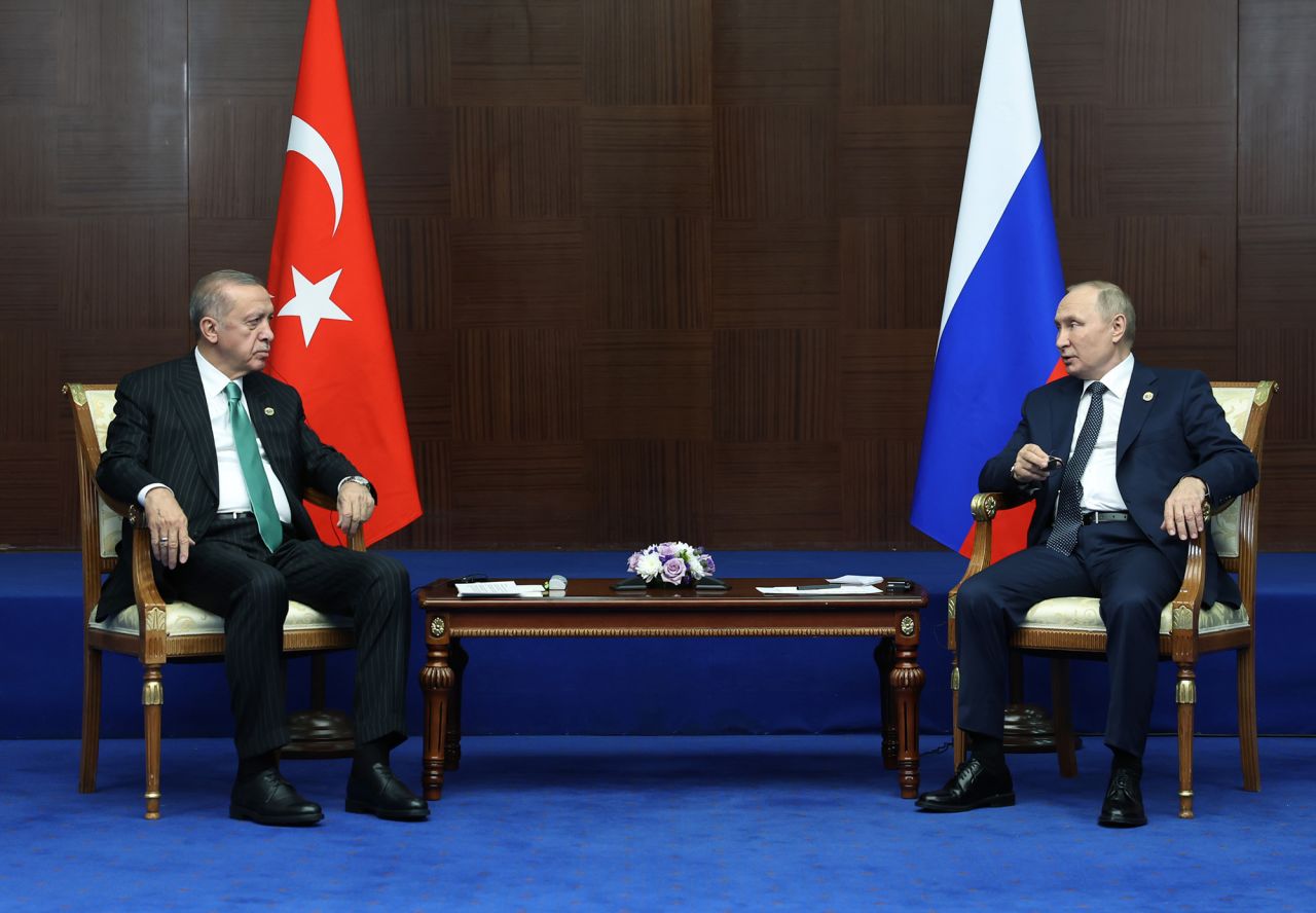 Turkish President, Recep Tayyip Erdogan, left, meets Russian President Vladimir Putin on the sidelines of the Conference on Interaction and Confidence Building Measures in Asia (CICA) in Astana, Kazakhstan, on October 13.