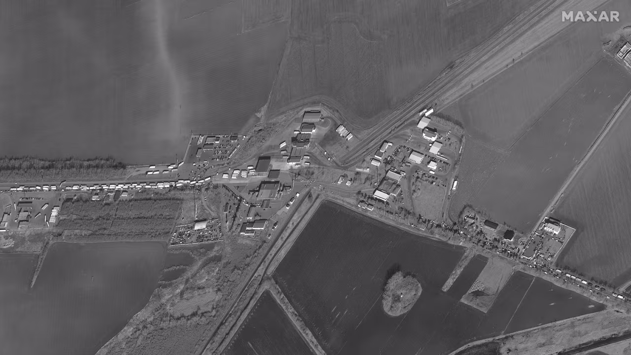 A satellite image of cars stuck in traffic waiting to leave Ukraine into Romania on February 25.