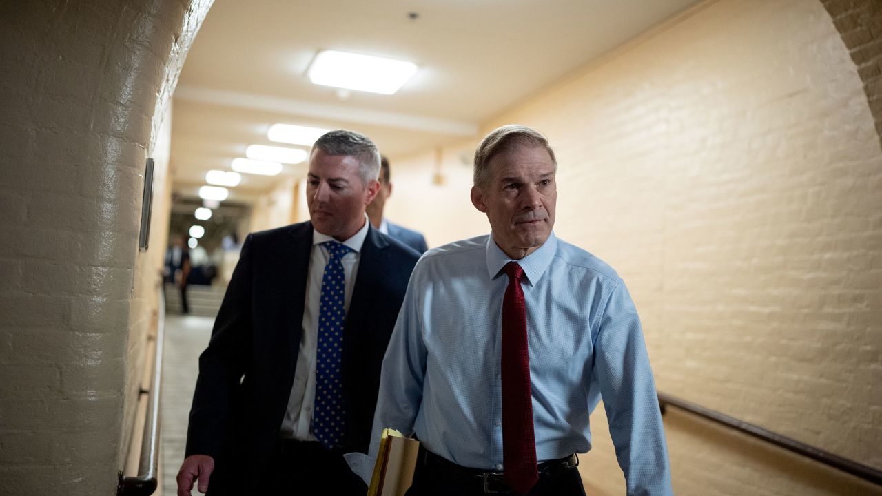 Rep. Jim Jordan, right, arrives for a weekly GOP caucus meeting on Capitol Hill on June 4 in Washington, DC.