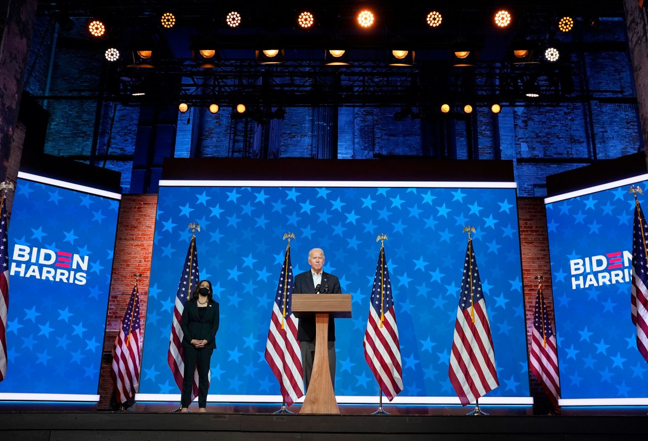 Democratic presidential nominee Joe Biden speaks while flanked by vice presidential nominee, Sen. Kamala Harris, at The Queen theater on November 5 in Wilmington, Delaware.