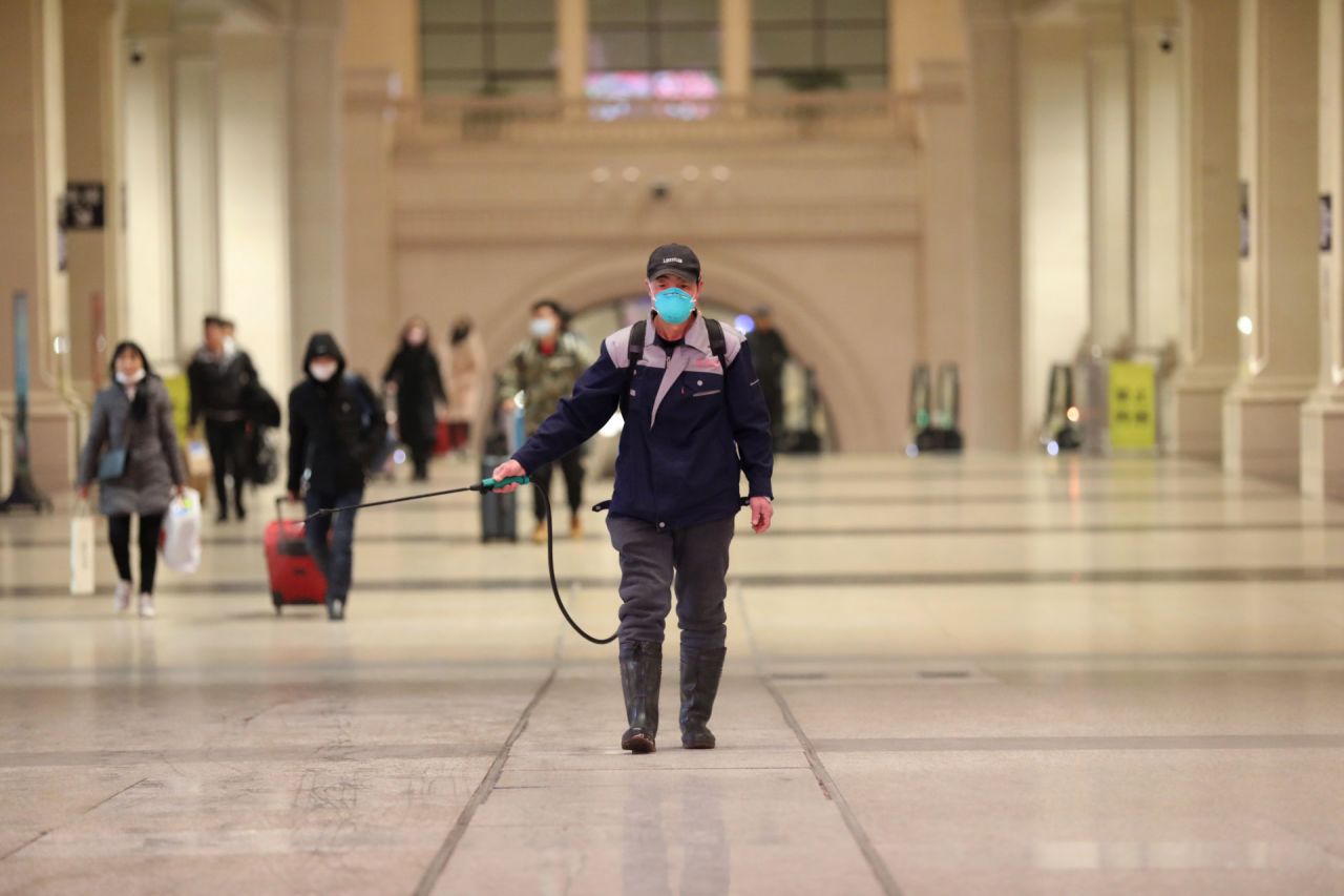 A worker disinfects a railway station in Wuhan, China, on Wednesday, January 22. 