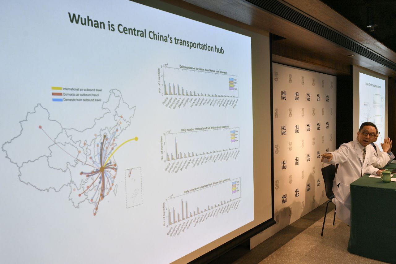 Gabriel Leung (right), chair professor of public health medicine at the Faculty of Medicine at the University of Hong Kong, speaks about the extent of the Wuhan coronavirus outbreak in China, during a news conference in Hong Kong on Tuesday.