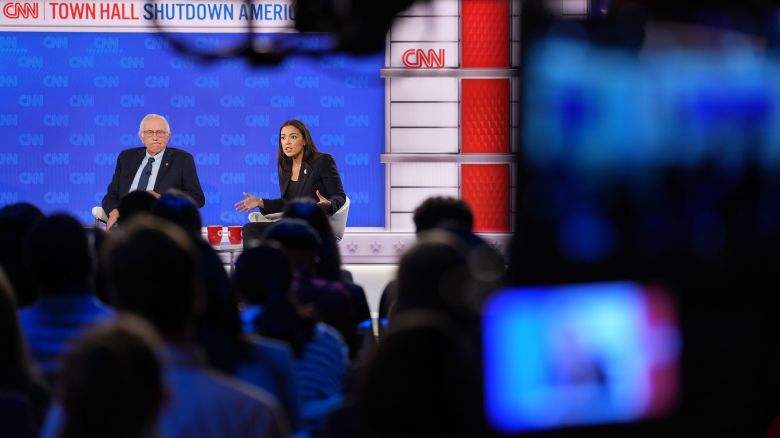 Sen. Bernie Sanders and Rep. Alexandria Ocasio-Cortez participate in a CNN town hall, moderated by Kaitlan Collins, in Washington, DC, on Wednesday, October 15, 2025. The two lawmakers fielded questions from Collins and a live studio audience, comprised of Democrats, Republicans, independents and those who have been directly impacted by the shutdown.