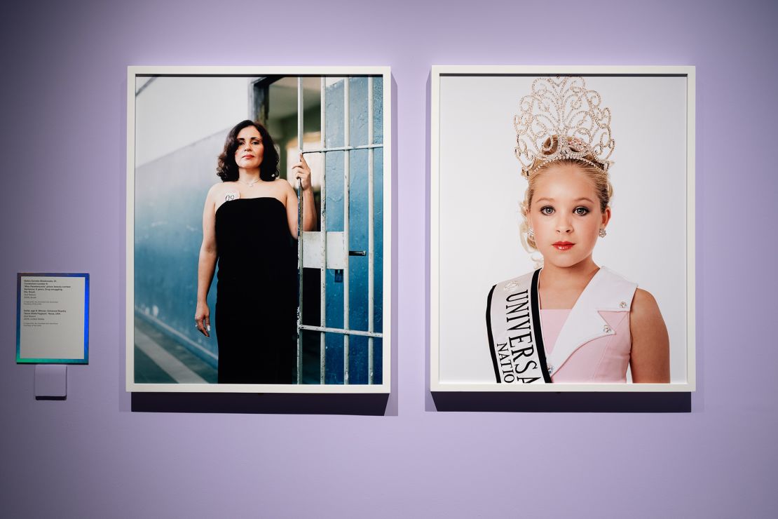 Zed Nelson's photography is a highlight of the exhibition. Here, his pieces "Miss Penetencaria" and "Love Me" are displayed in the section titled "Beauty as Currency."