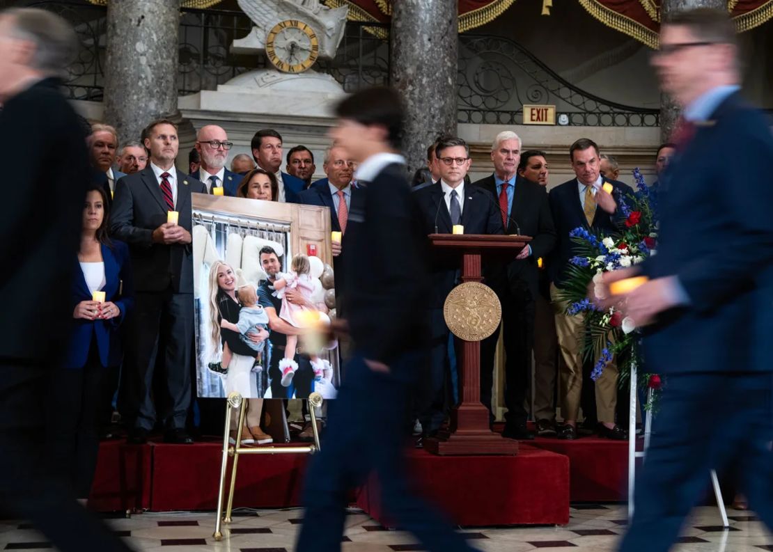 A poster by Erika and Charlie Kirk and their two sons displayed during a memorial service at the Capitol Statues Hall on Sept. 15.
