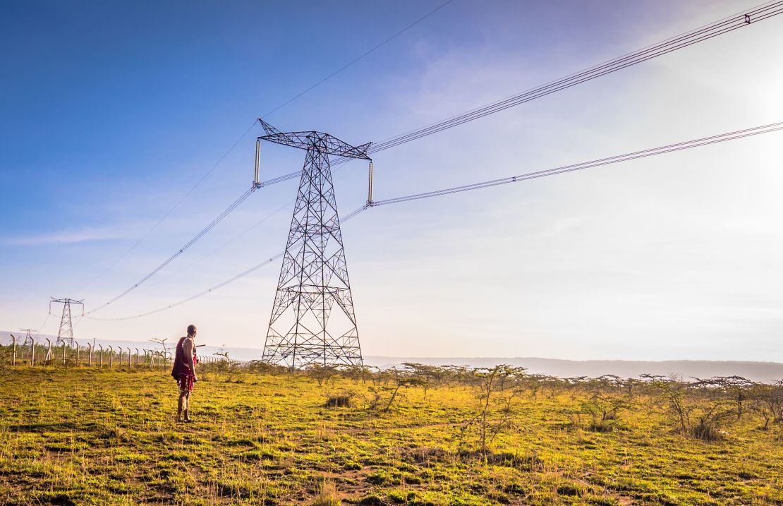 A man looks at part of the 650 miles of transmission lines that makes up the Ethiopia-Kenya Electricity Highway.