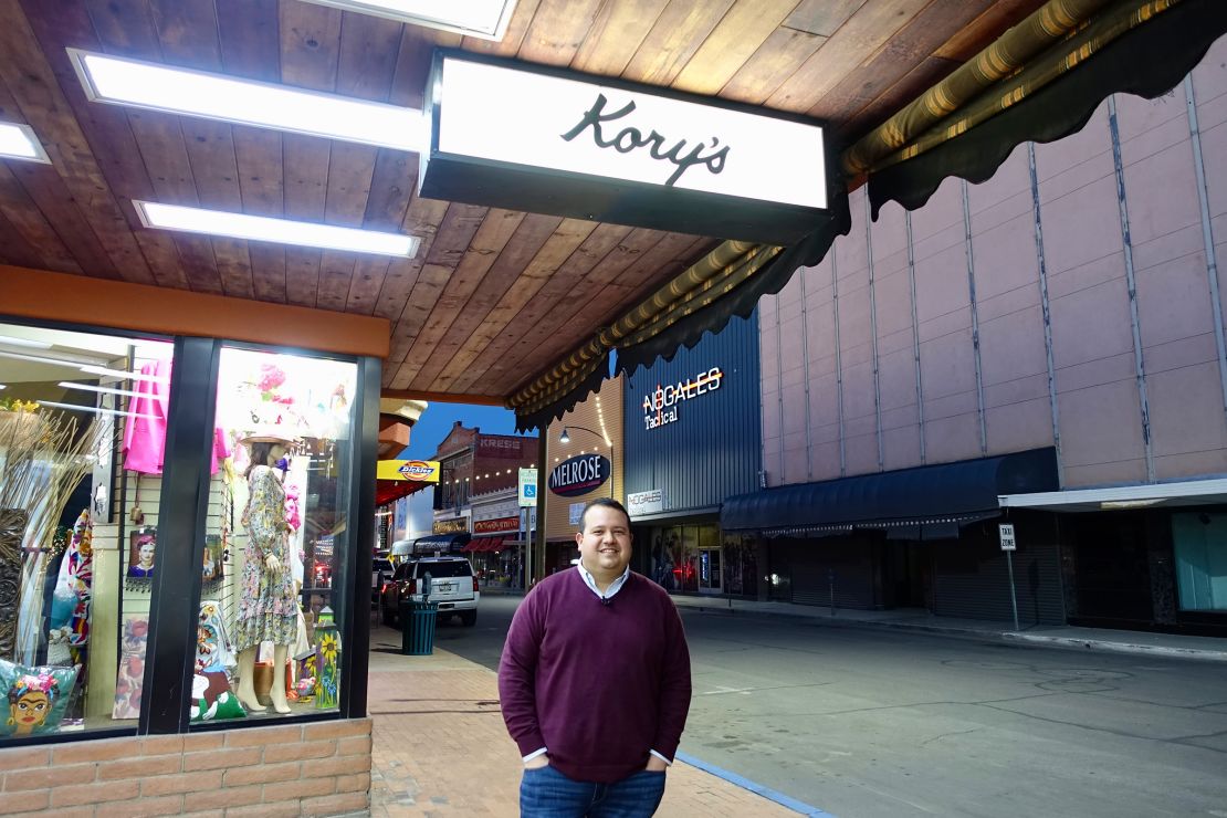 Evan Kory poses for a photo near his store in Nogales, Arizona.