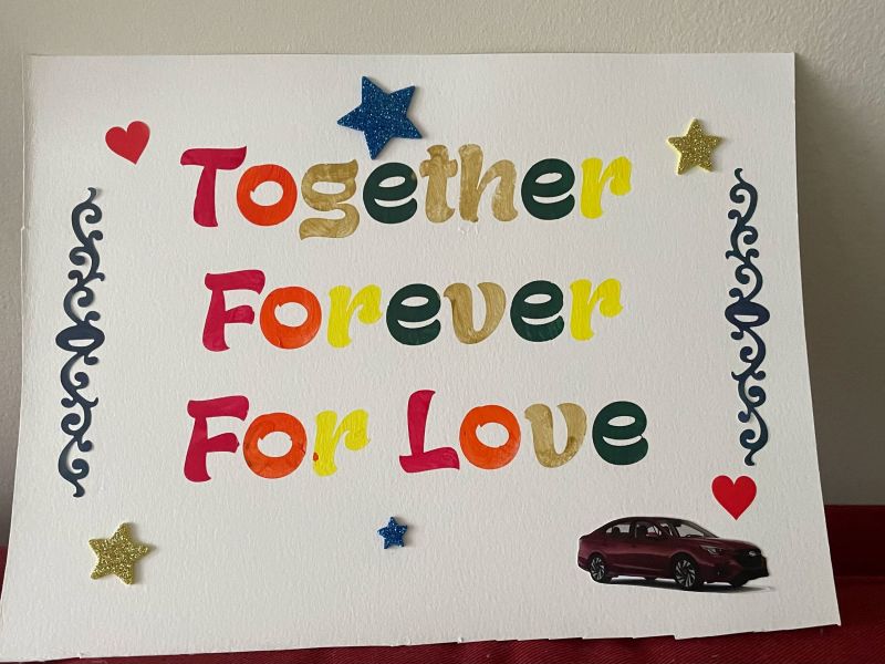 The car in this piece by Ezra Bozeman represents the time he helped Christine find a replacement for a vehicle that was damaged in a storm.