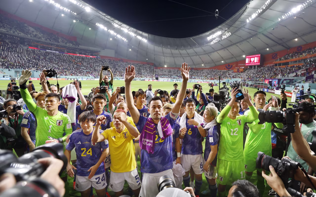 Japan captain Maya Yoshida, center, and his teammates after defeating Spain 2-1 at Khalifa International Stadium in Doha, Qatar on December 2.