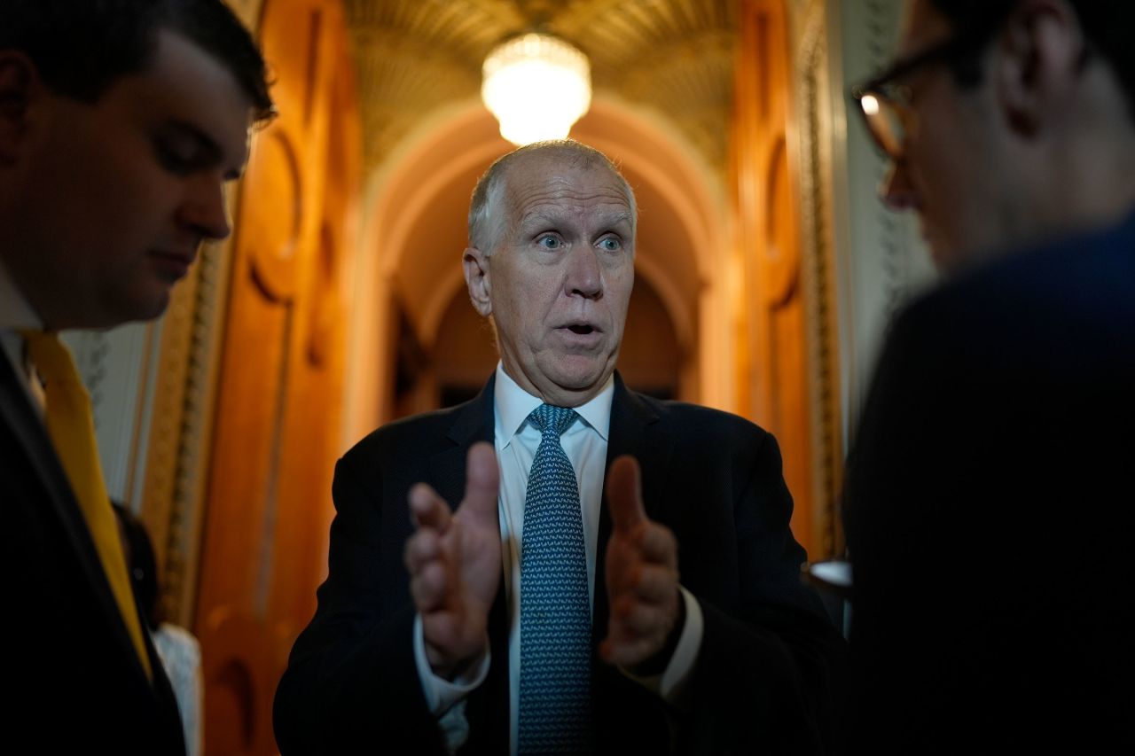 Sen. Thom TIllis speaks with reporters as he arrives for a vote at the U.S. Capitol on July 31 in Washington, DC. 