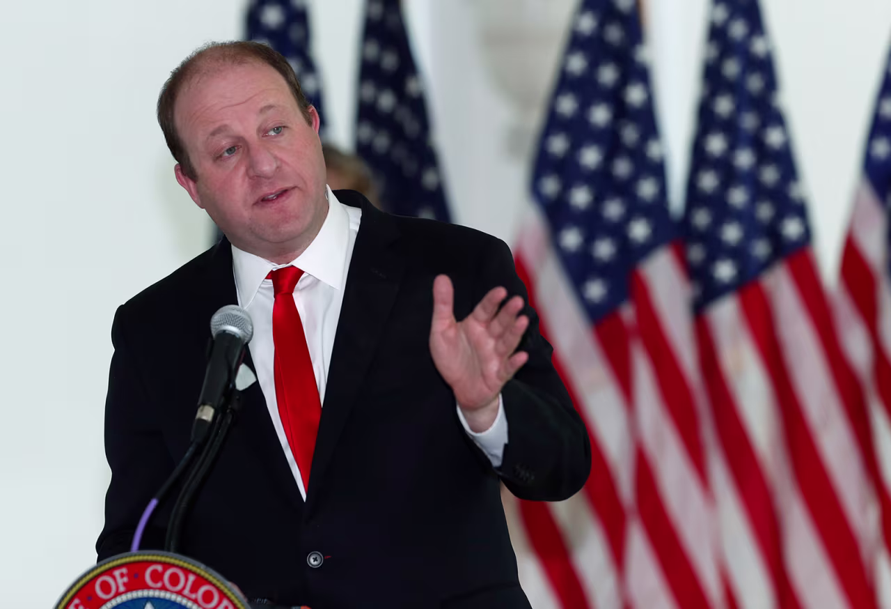 Colorado Gov. Jared Polis pictured during a news conference on April 20, in Denver. 