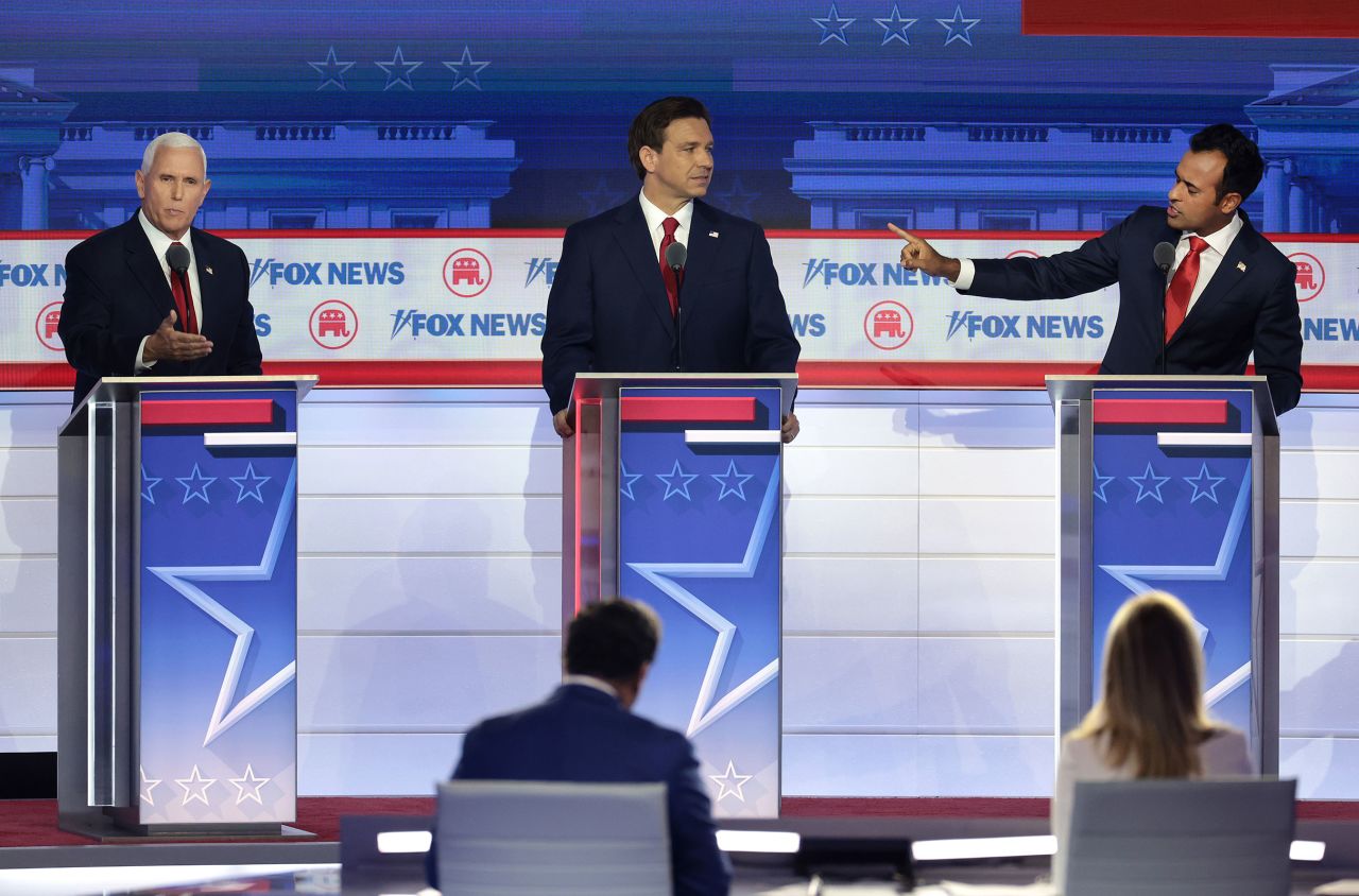 Republican presidential candidates former Vice President Mike Pence, Florida Gov. Ron DeSantis and Vivek Ramaswamy participate in the first debate of the GOP primary season hosted by FOX News at the Fiserv Forum on August 23, 2023 in Milwaukee, Wisconsin. 