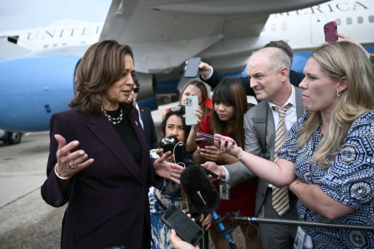 US Vice President and Democratic presidential candidate Kamala Harris speaks to reporters upon arrival at Joint Base Andrews in Maryland on July 25.