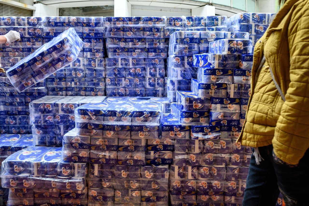 Toilet paper is stacked for sale outside a store in Hong Kong on February 8.