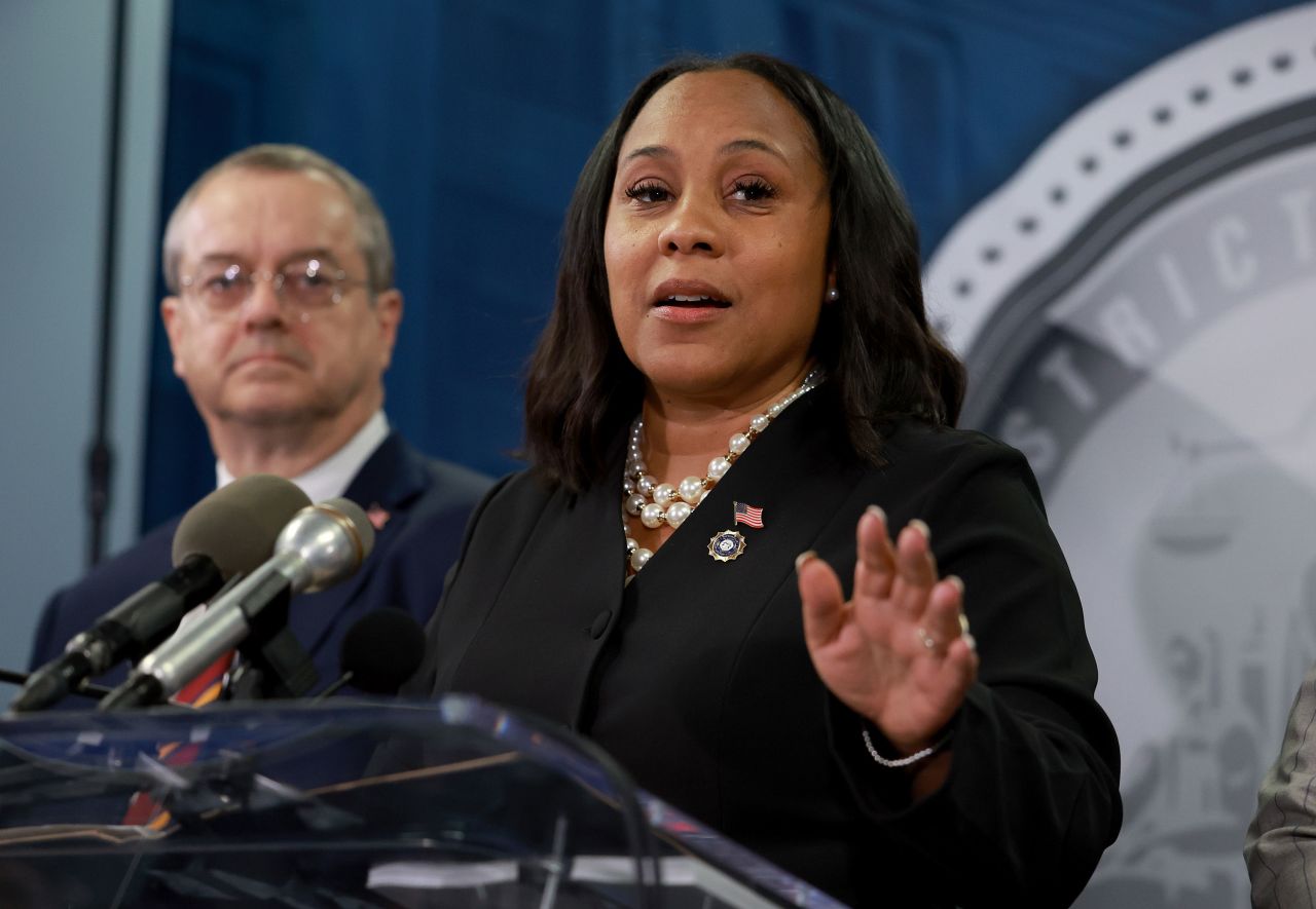 Fulton County District Attorney Fani Willis speaks during a news conference in Atlanta on August 14.