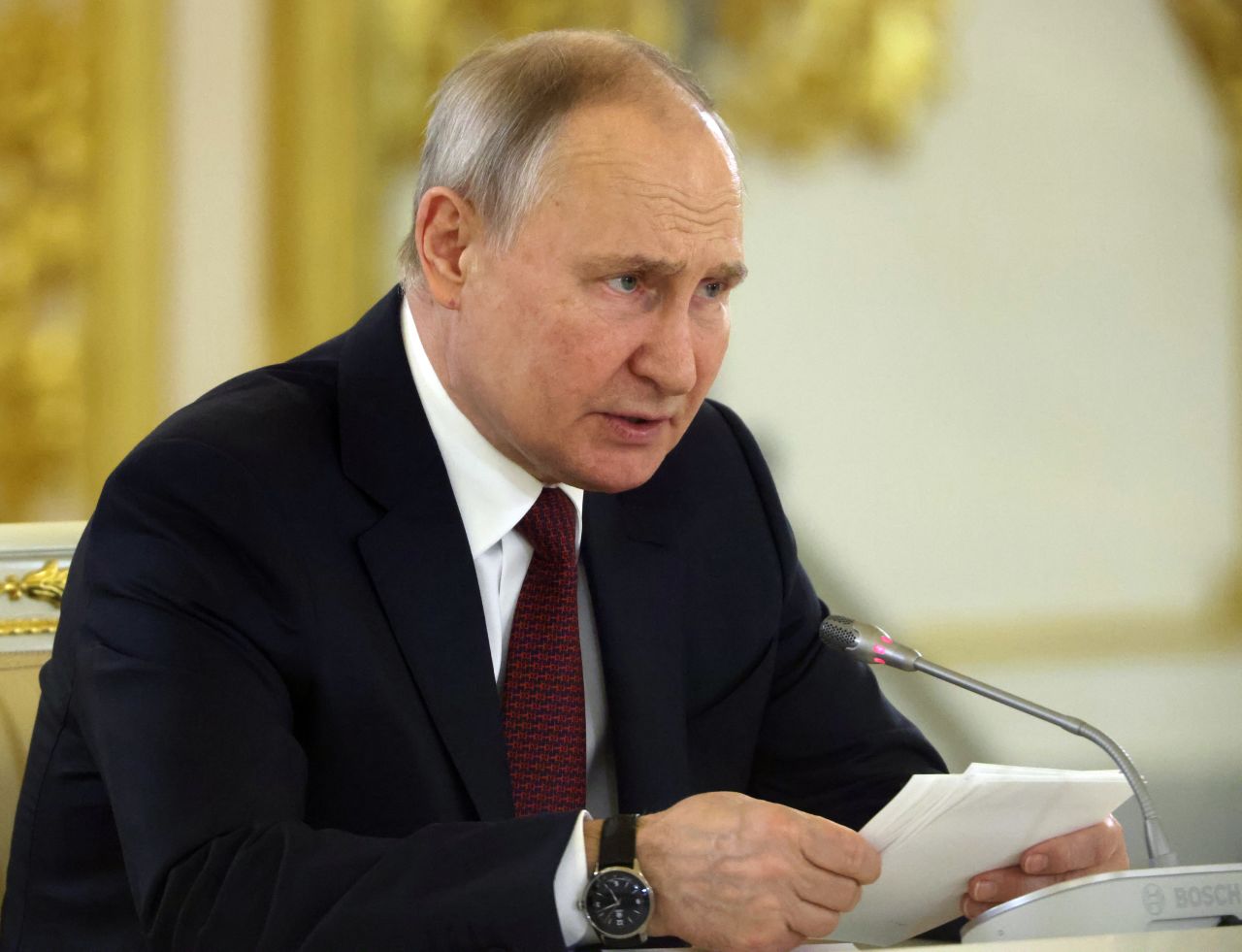 Russian President Vladimir Putin talks at the Grand Kremlin Palace, in Moscow, Russia, on March 21.