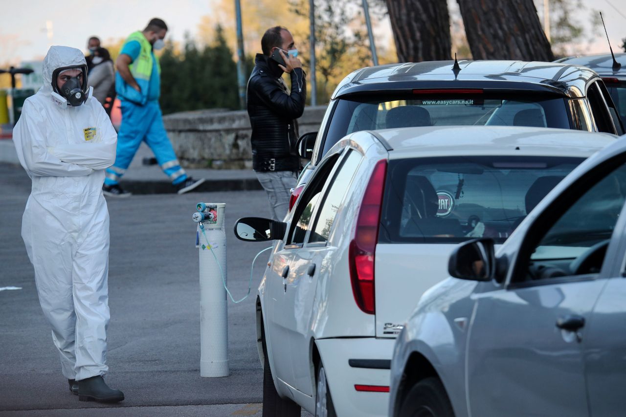 People with suspected cases of Covid-19 are treated in their cars at Cotugno hospital in Naples, Italy, on November 7.