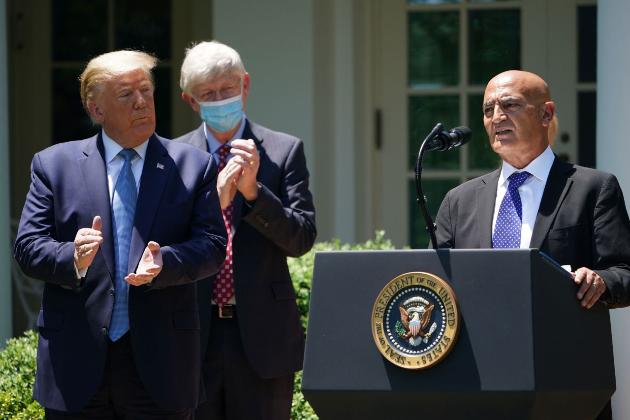 Chief Adviser "Warp Speed" vaccine effort Monecef Slaoui (R), with US President Donald Trump, speaks on vaccine development on May 15 in the Rose Garden of the White House in Washington.