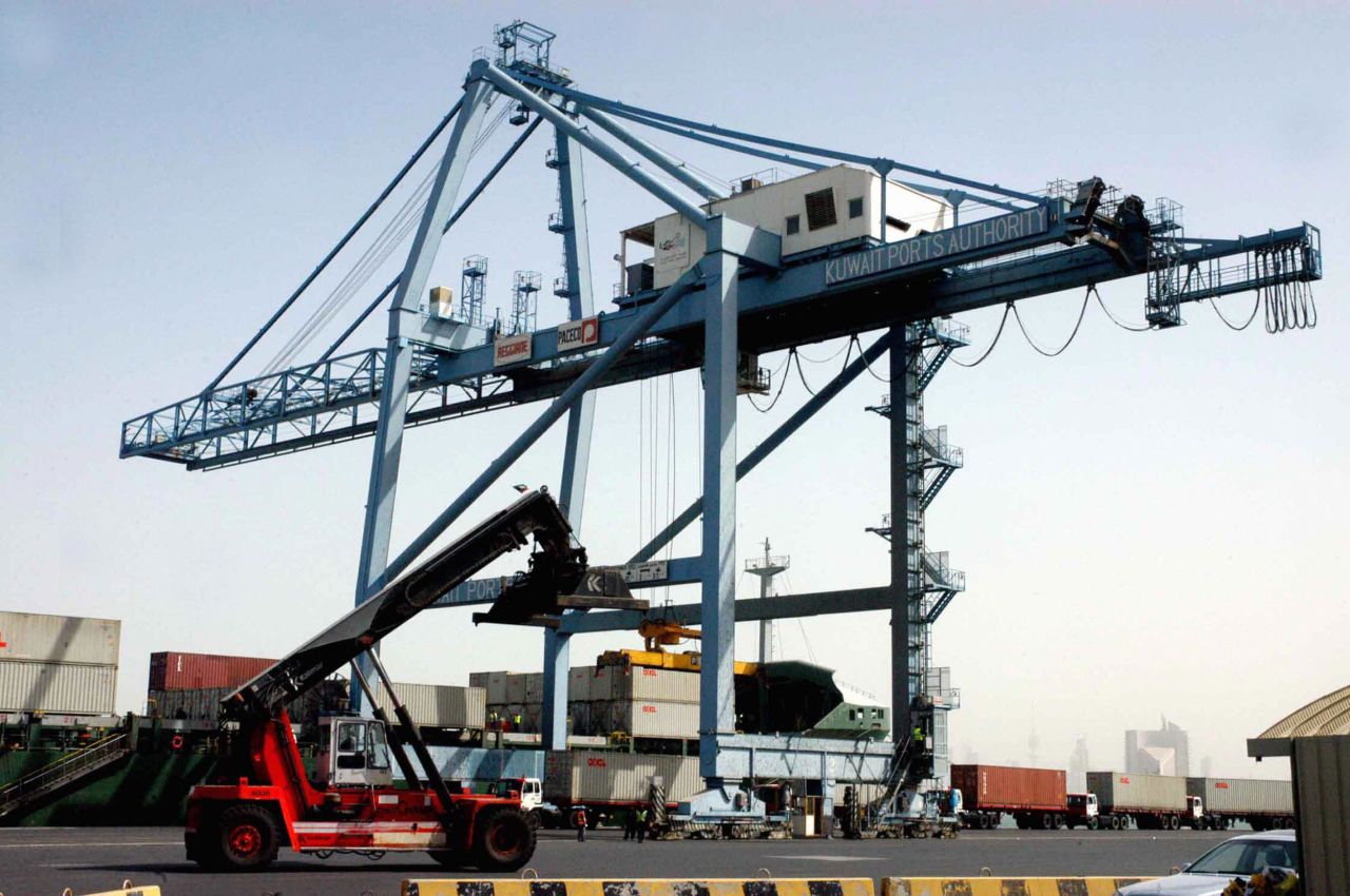 A container crane stands idle at Shuwaikh port in Kuwait City, Kuwait, in 2009.