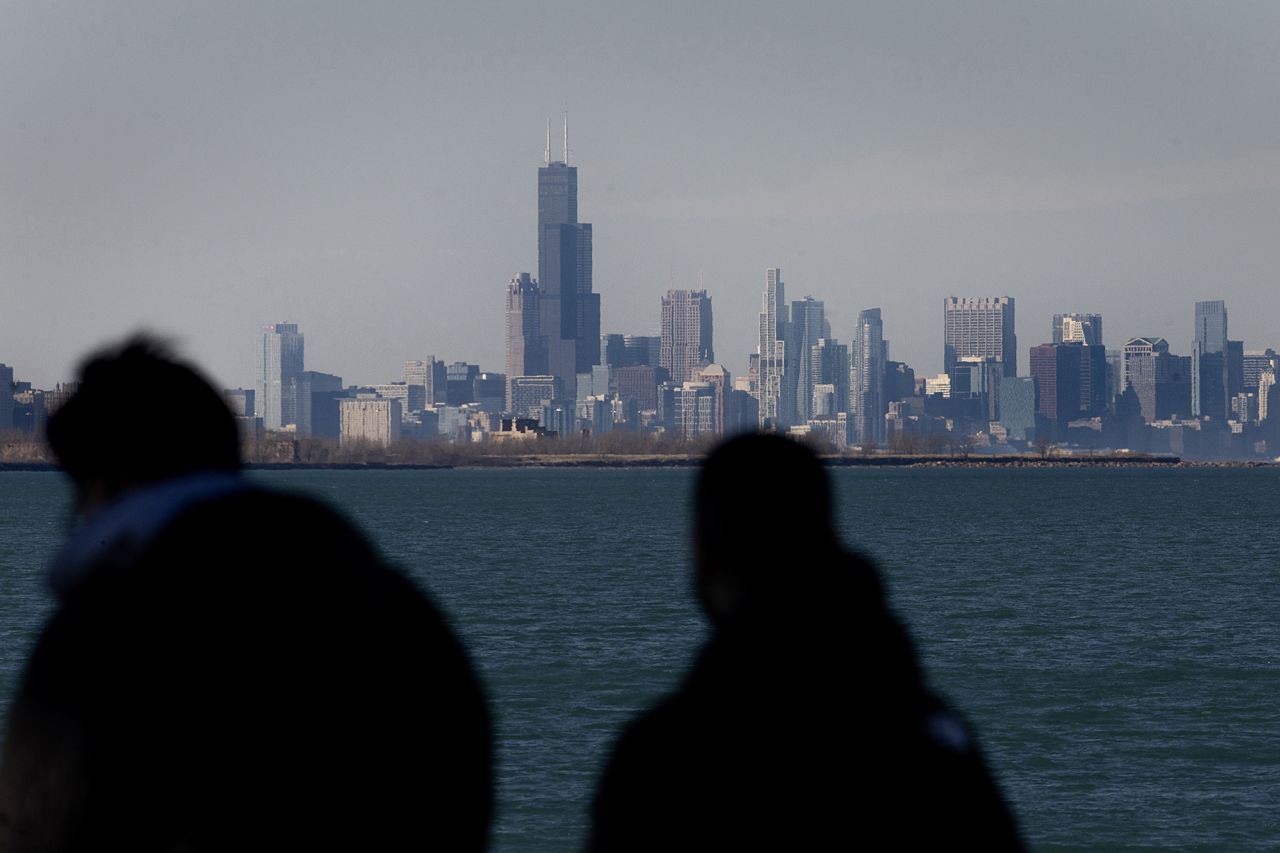 The Chicago skyline is seen across Lake Michigan on February 18 in Whiting, Indiana.?