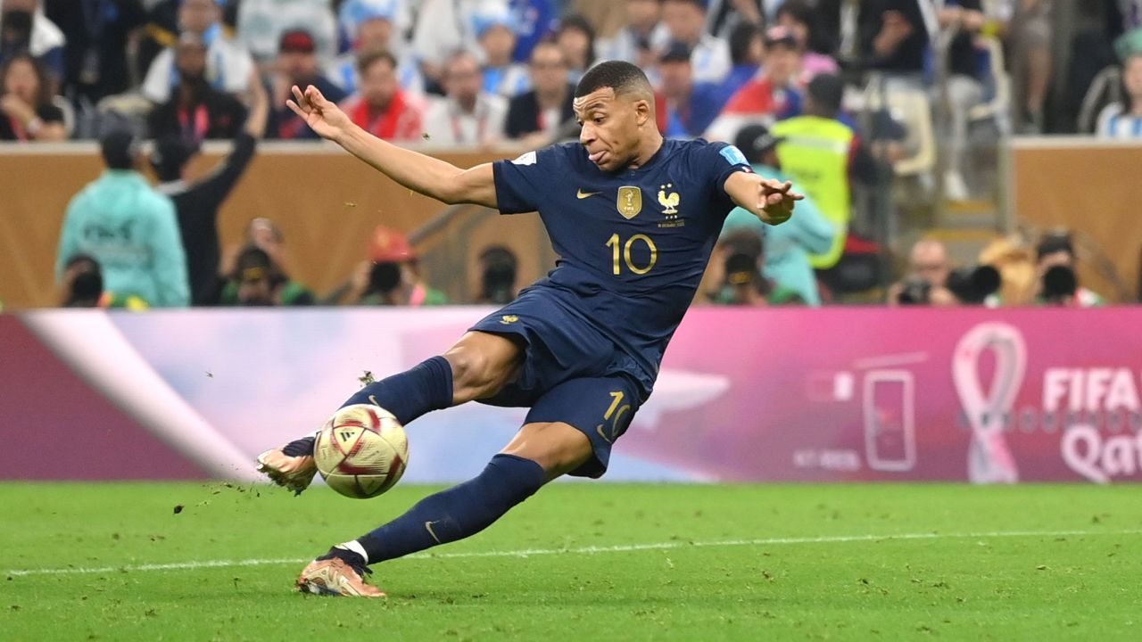 France's Kylian Mbappe scores his second goal to tie the match at 2-2.