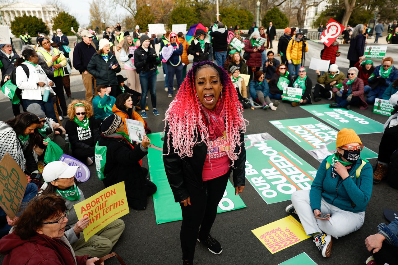 Demonstrators for abortion rights protest outside the U.S. Supreme Court today as justices hear oral arguments in a bid by President Joe Biden's administration to preserve broad access to the abortion pill, in Washington.