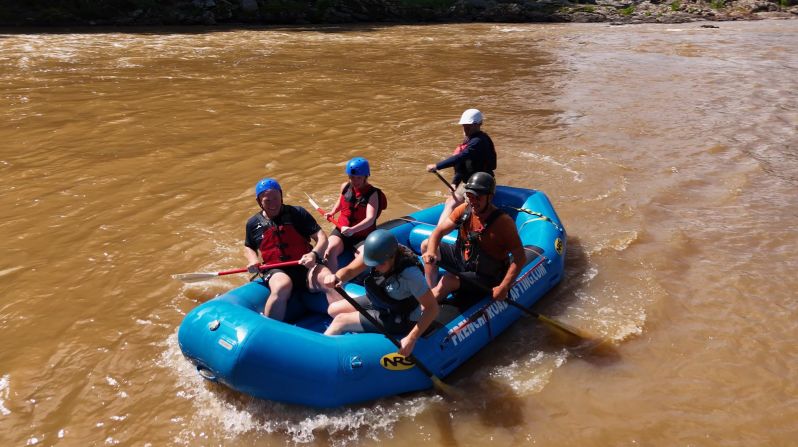 Korey Hampton and colleagues show John King and CNN’s Allie Malloy a popular stretch of rapids along the French Broad River in western North Carolina.