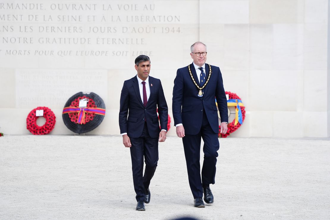 Prime Minister Rishi Sunak with National Chair, Royal British Legion, Jason Coward after laying wreath during  the 80th anniversary of D-Day, held at the British Normandy Memorial in Ver-sur-Mer, Normandy, France, on June 6.